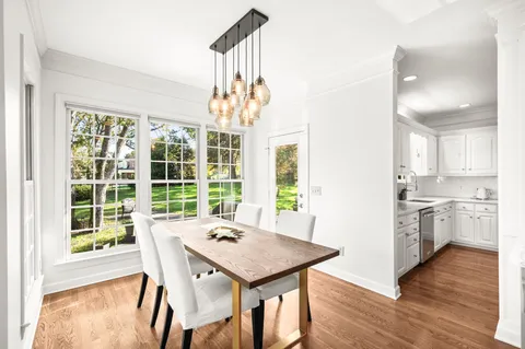 a utility room with sink dryer and washer