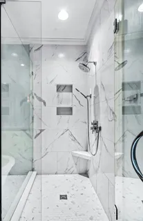 a utility room with cabinets dryer and baby