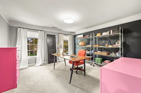 a view of a patio with couches and potted plants