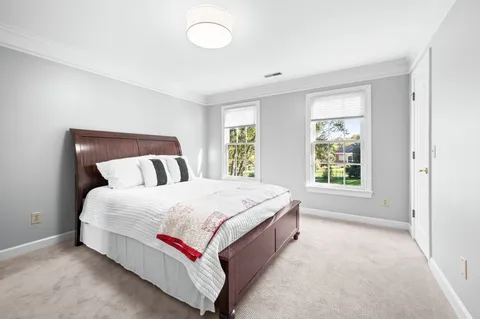 a view of a park with bench and a slide