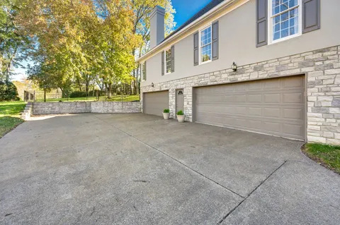 a view of entryway wih livingroom and stairs