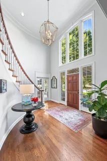 a kitchen with stainless steel appliances a stove and cabinets