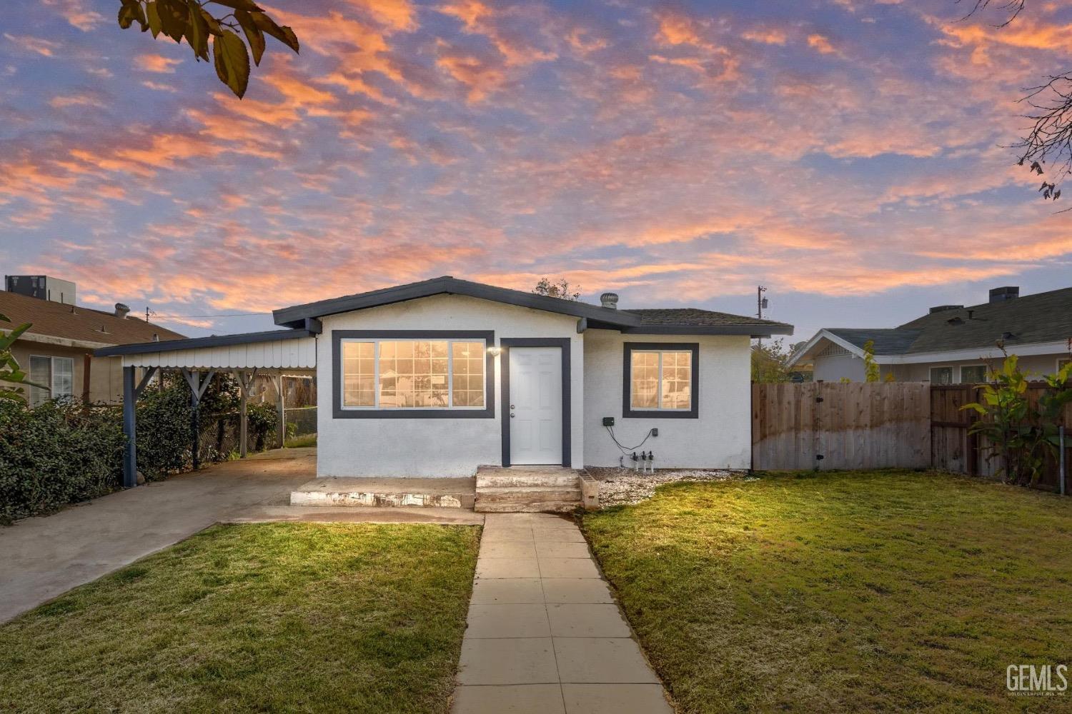 Undisclosed Address Bakersfield, CA 93305 - Photo 1 of 32 a view of a house with a swimming pool