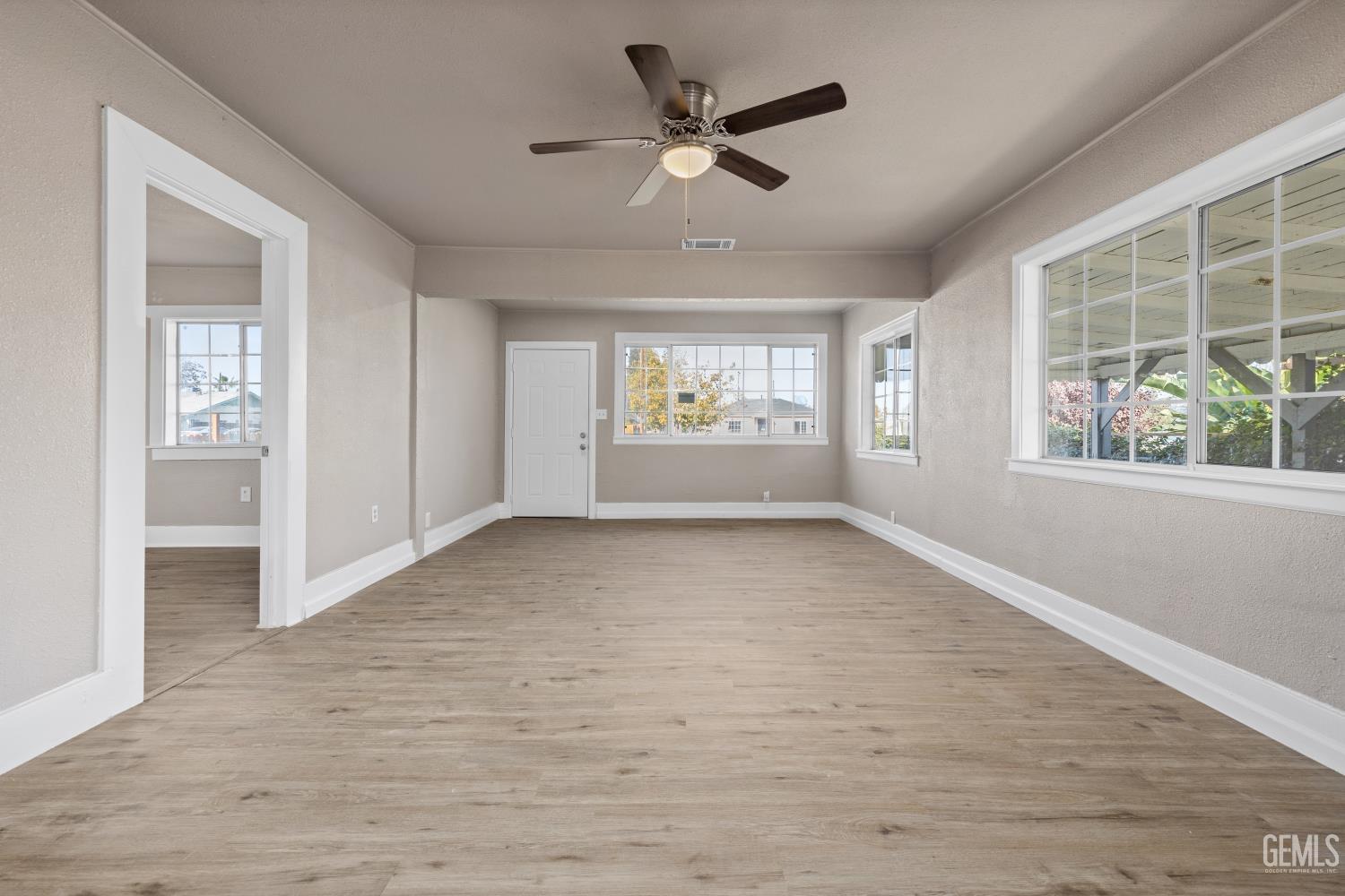 Undisclosed Address Bakersfield, CA 93305 - Photo 7 of 32 a view of an empty room with a window