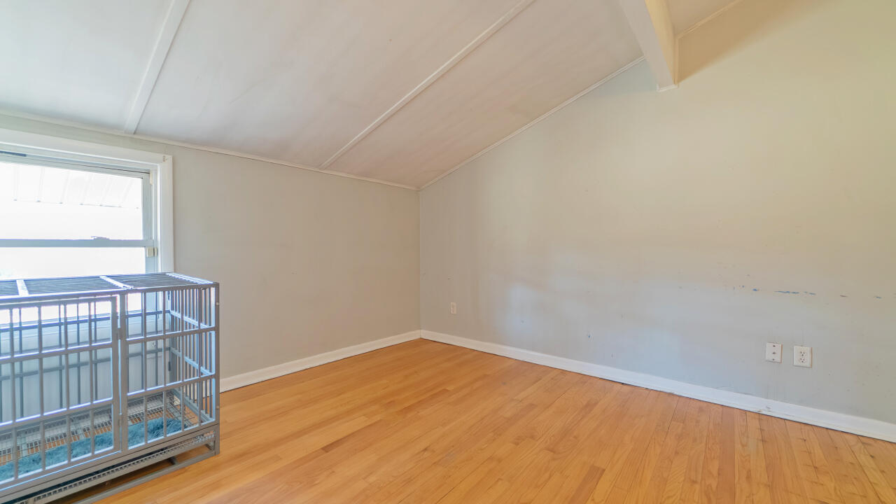 6318 Garfield Street Merrillville, IN 46410 - Photo 21 of 27 a view of empty room with wooden floor and fan