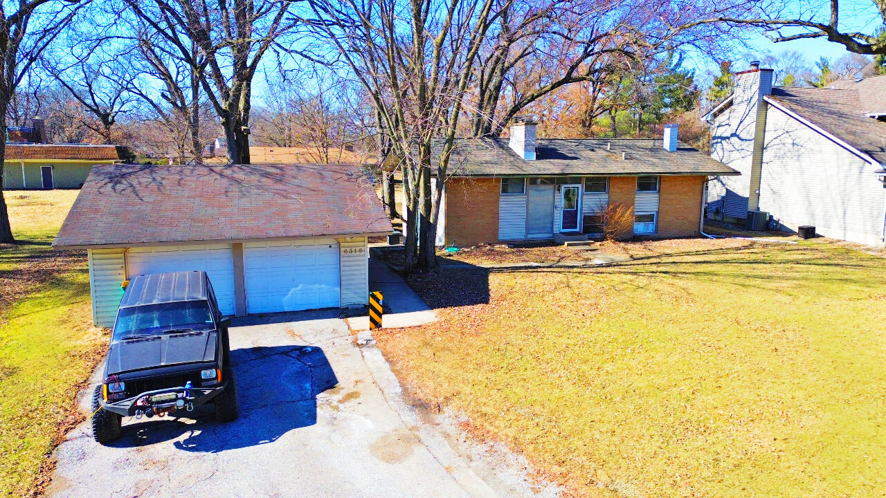 6318 Garfield Street Merrillville, IN 46410 - Photo 27 of 27 a view of a house with a patio