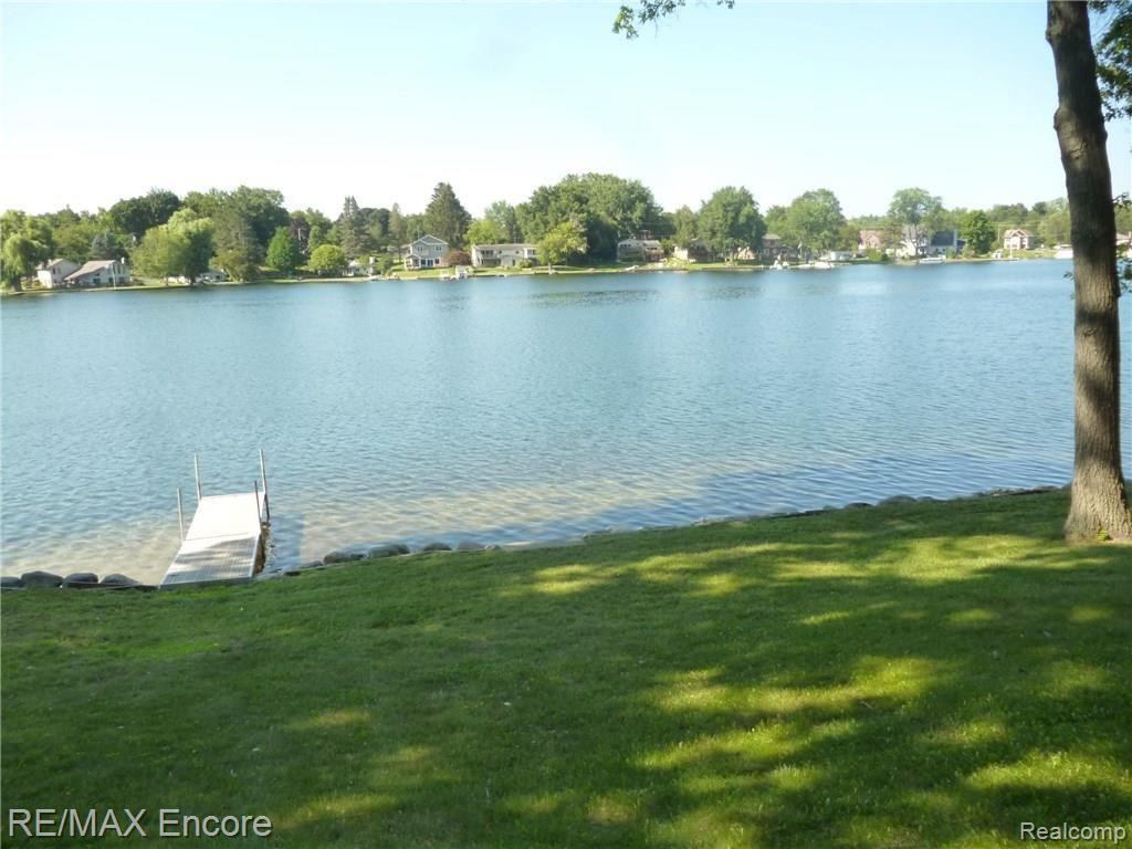 9589 Cherrywood Road Clarkston, MI 48348 - Photo 44 of 46 Boat dock is included in the sale . Get ready for an amazing summer on the lake .