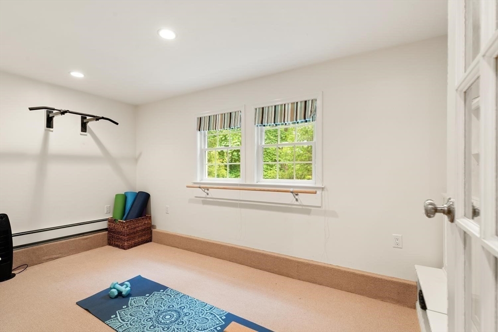 105 Thornberry Road Winchester, MA 01890 - Photo 26 of 35 a living room with furniture and a window