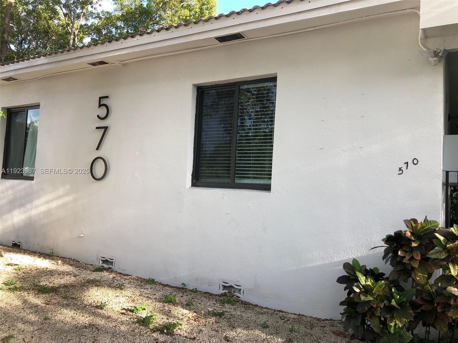 570 Northeast 69th Street, Unit 2 Miami, FL 33138 - Photo 2 of 21 a view of a garage