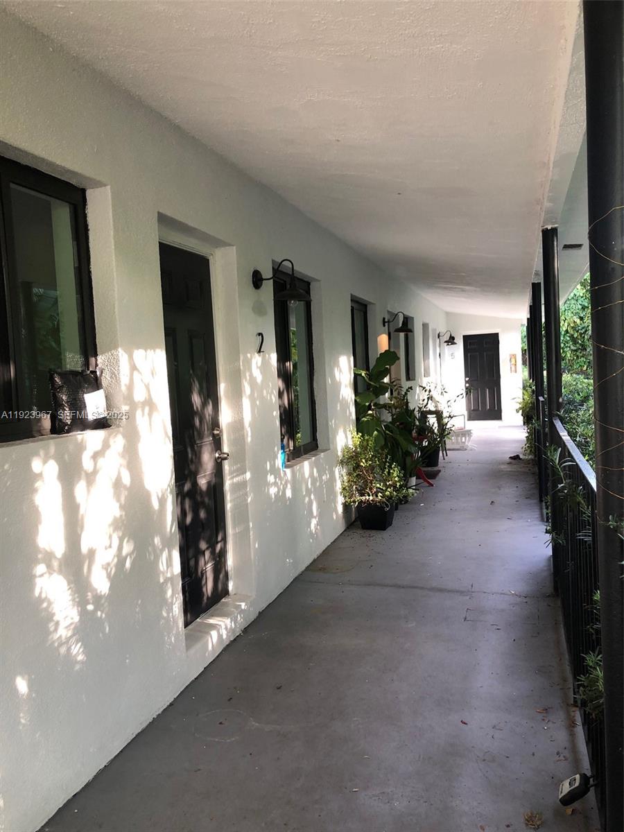 570 Northeast 69th Street, Unit 2 Miami, FL 33138 - Photo 4 of 21 a view of a livingroom with furniture and a window