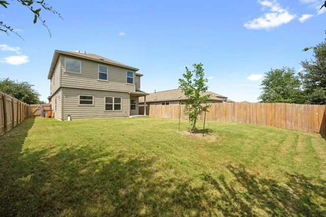 a house view with a garden space