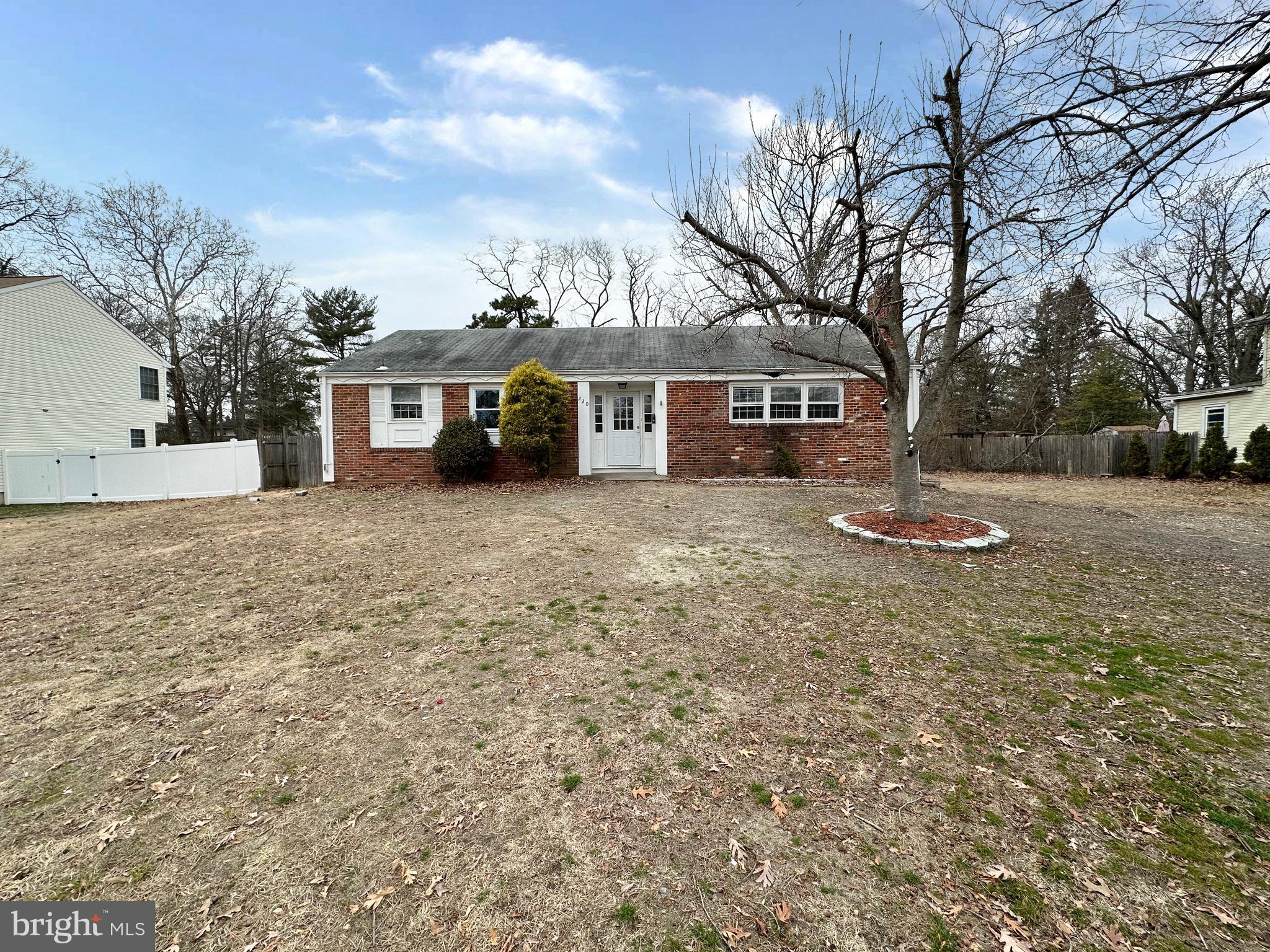 220 Myrtle Avenue Lindenwold, NJ 08021 - Photo 1 of 11 a front view of a house with a yard and trees