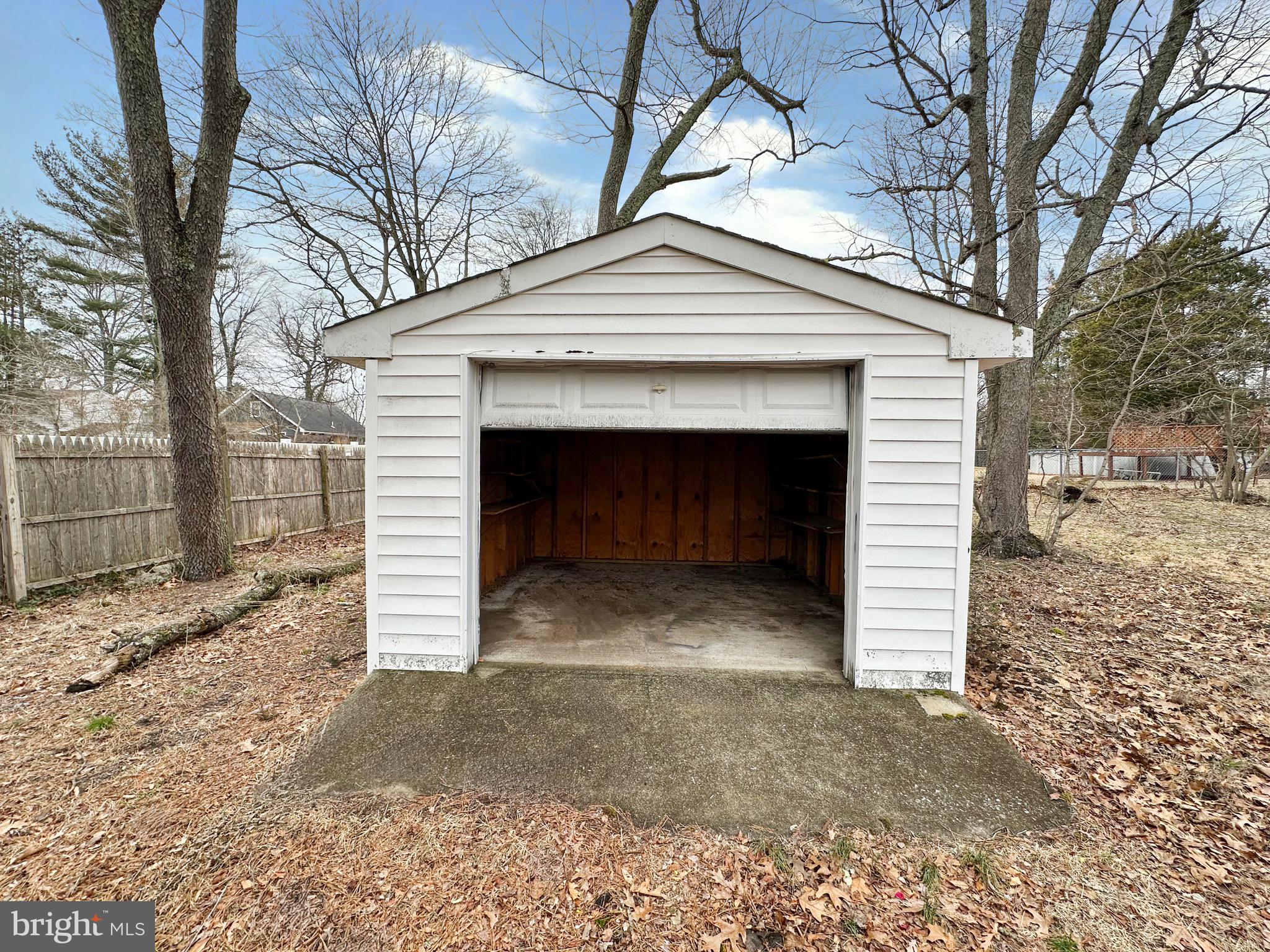 220 Myrtle Avenue Lindenwold, NJ 08021 - Photo 3 of 11 a view of a house with a yard and garage
