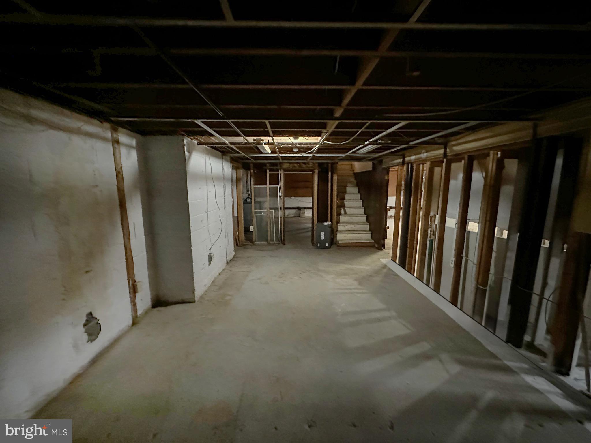 220 Myrtle Avenue Lindenwold, NJ 08021 - Photo 5 of 11 a view of empty room with wooden walls