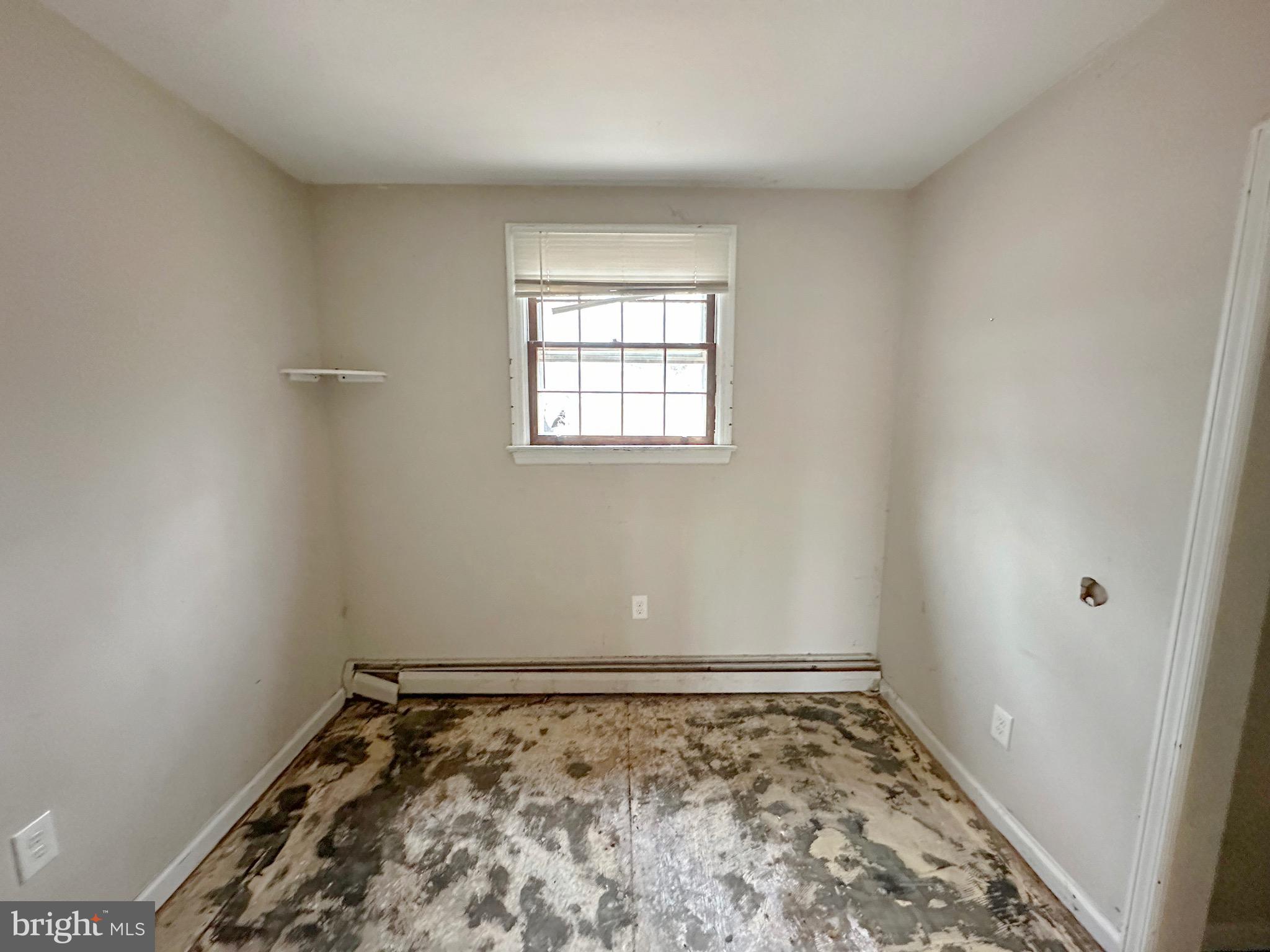 220 Myrtle Avenue Lindenwold, NJ 08021 - Photo 6 of 11 a view of a room with wooden floor and window