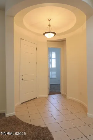 a view of a room with a hallway