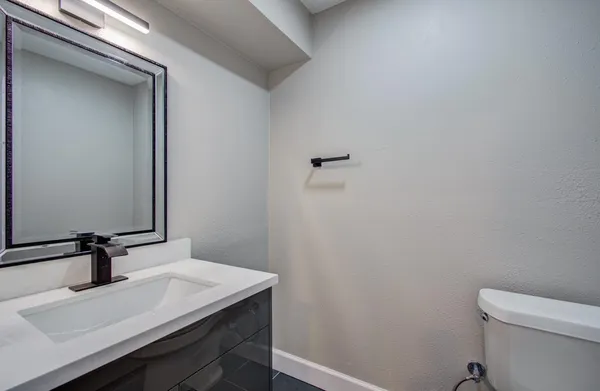 a bathroom with a sink and a toilet