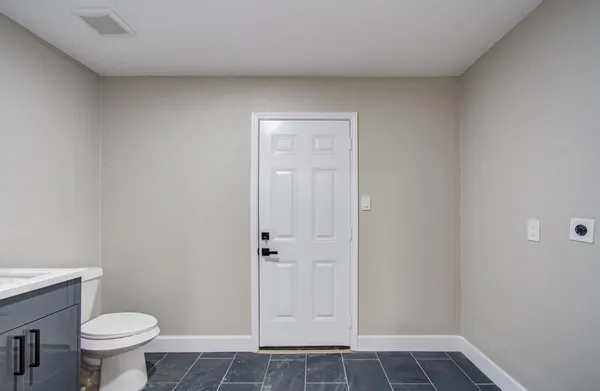 a bathroom with a sink and a toilet