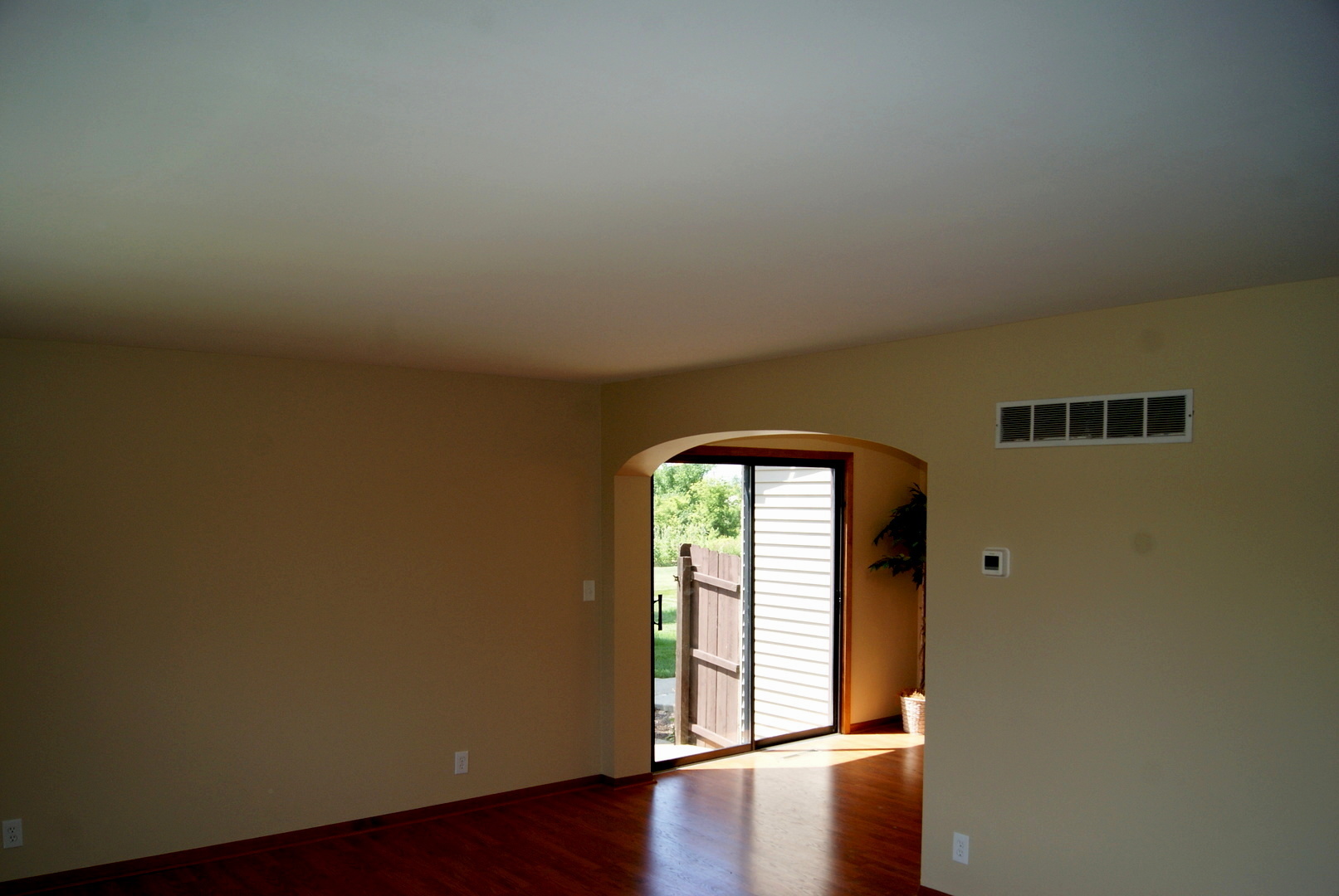 264 Circlegate Road New Lenox, IL 60451 - Photo 11 of 28 an empty room with wooden floor closet and windows