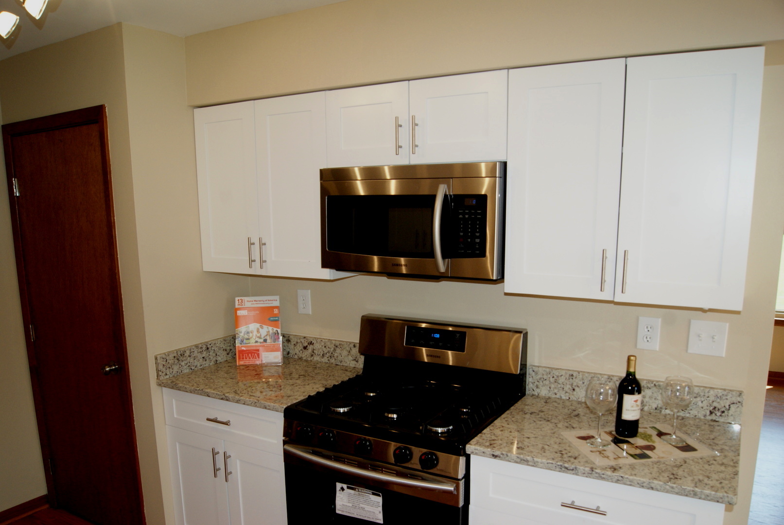 264 Circlegate Road New Lenox, IL 60451 - Photo 3 of 28 a kitchen with a sink and a stove top oven