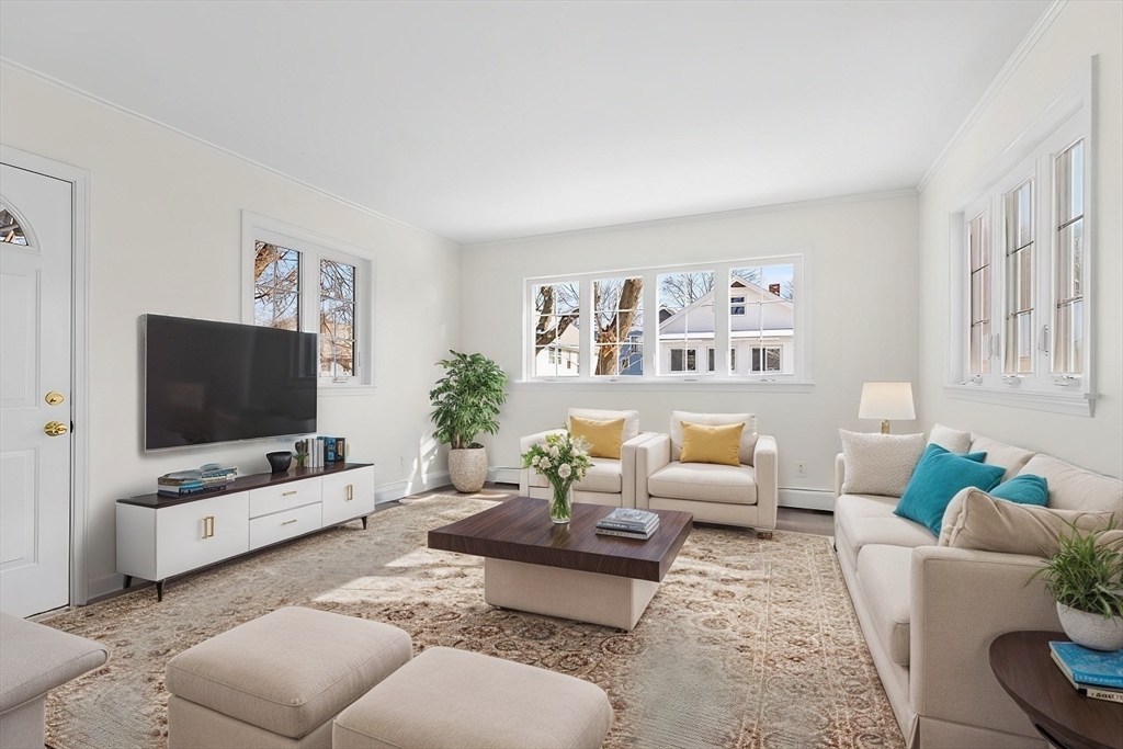 16 York Avenue Watertown, MA 02472 - Photo 15 of 34 a living room with furniture and a flat screen tv