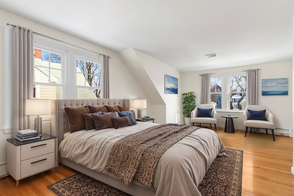 16 York Avenue Watertown, MA 02472 - Photo 21 of 34 a bedroom with a large bed and a window