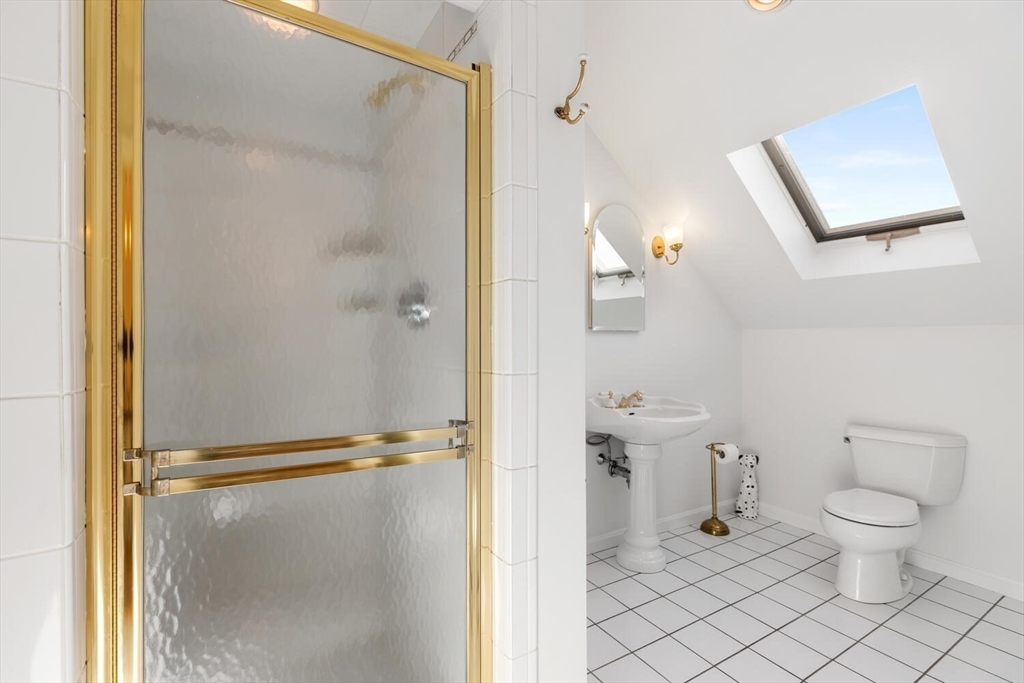 16 York Avenue Watertown, MA 02472 - Photo 24 of 34 a bathroom with a toilet and a shower