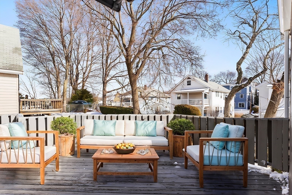 16 York Avenue Watertown, MA 02472 - Photo 28 of 34 a outdoor space with patio the couches and a potted plant on a table