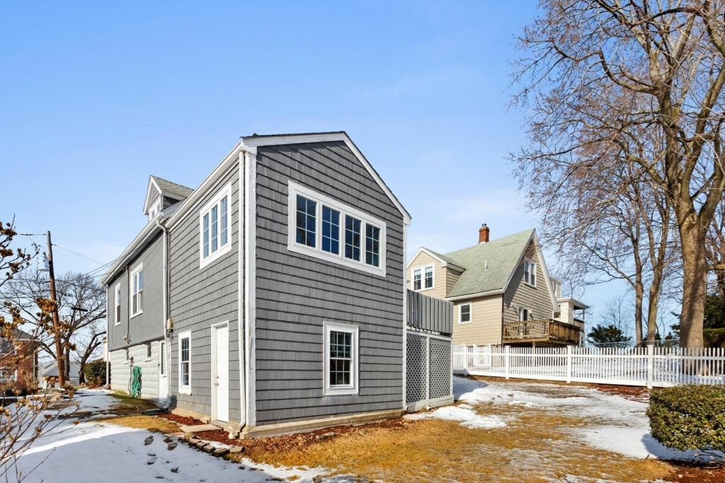 16 York Avenue Watertown, MA 02472 - Photo 33 of 34 a front view of a house with a yard
