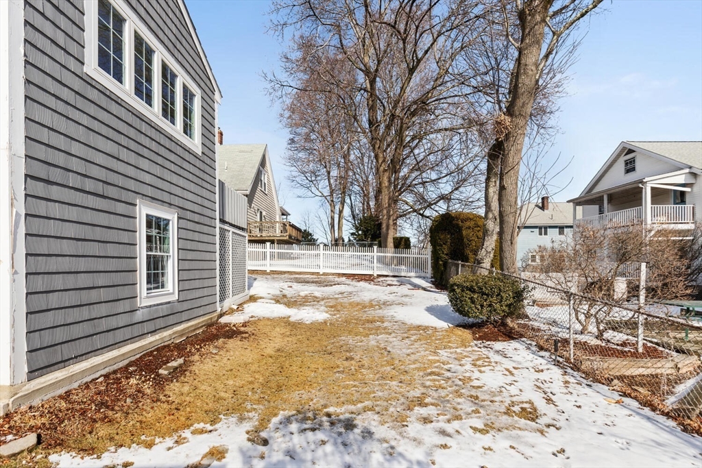 16 York Avenue Watertown, MA 02472 - Photo 34 of 34 a view of a backyard with large tree