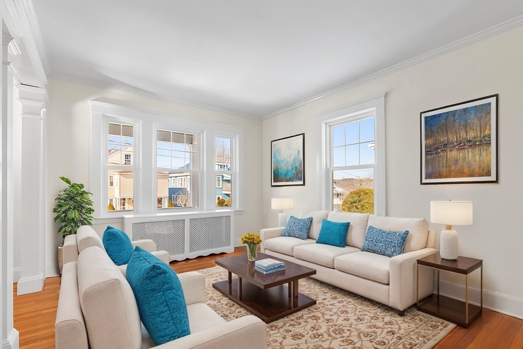 16 York Avenue Watertown, MA 02472 - Photo 7 of 34 a living room with furniture and a large window