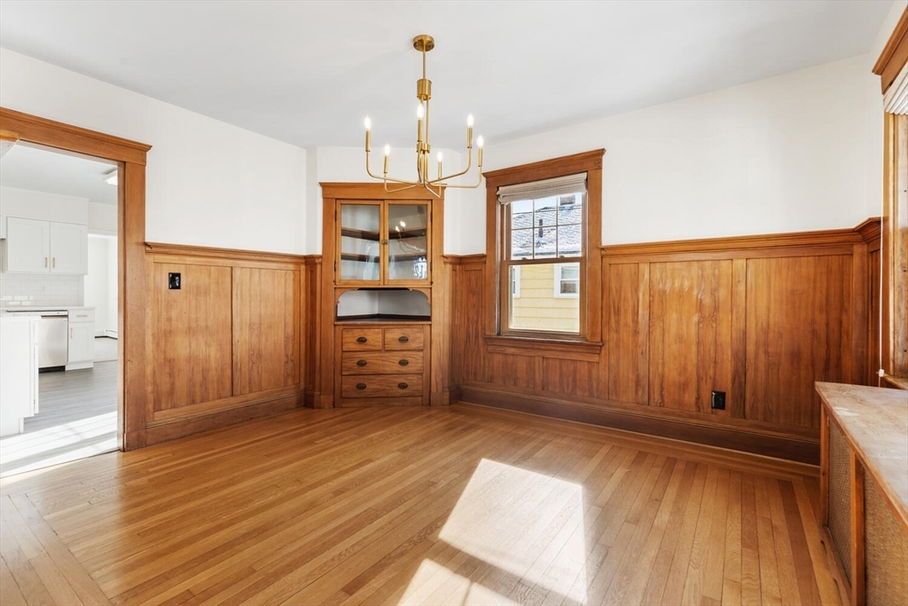 16 York Avenue Watertown, MA 02472 - Photo 8 of 34 a spacious bedroom with a bed and a window
