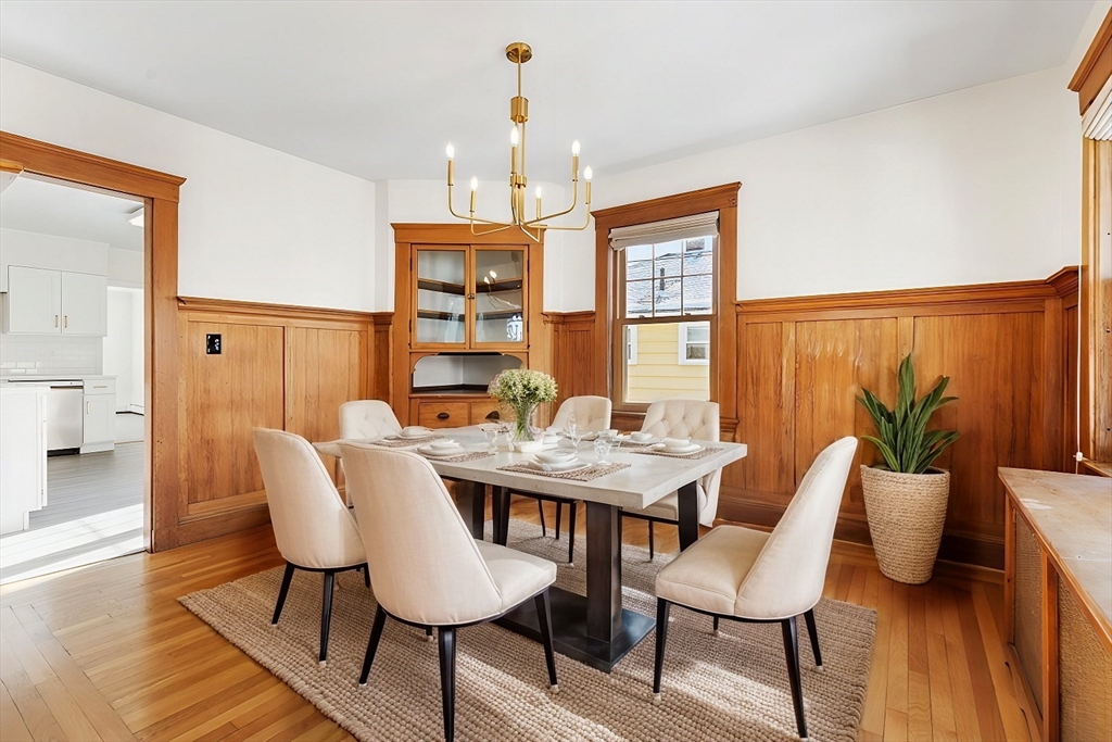16 York Avenue Watertown, MA 02472 - Photo 9 of 34 a view of a dining room with furniture and wooden floor