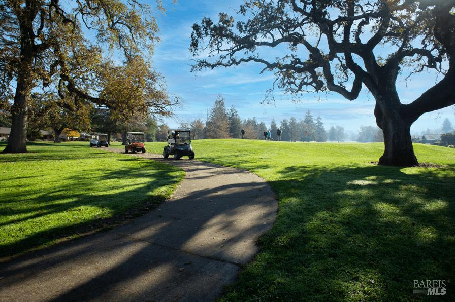 23 Valley Green Street Santa Rosa, CA 95409 - Photo 47 of 58 a view of a golf course with a garden