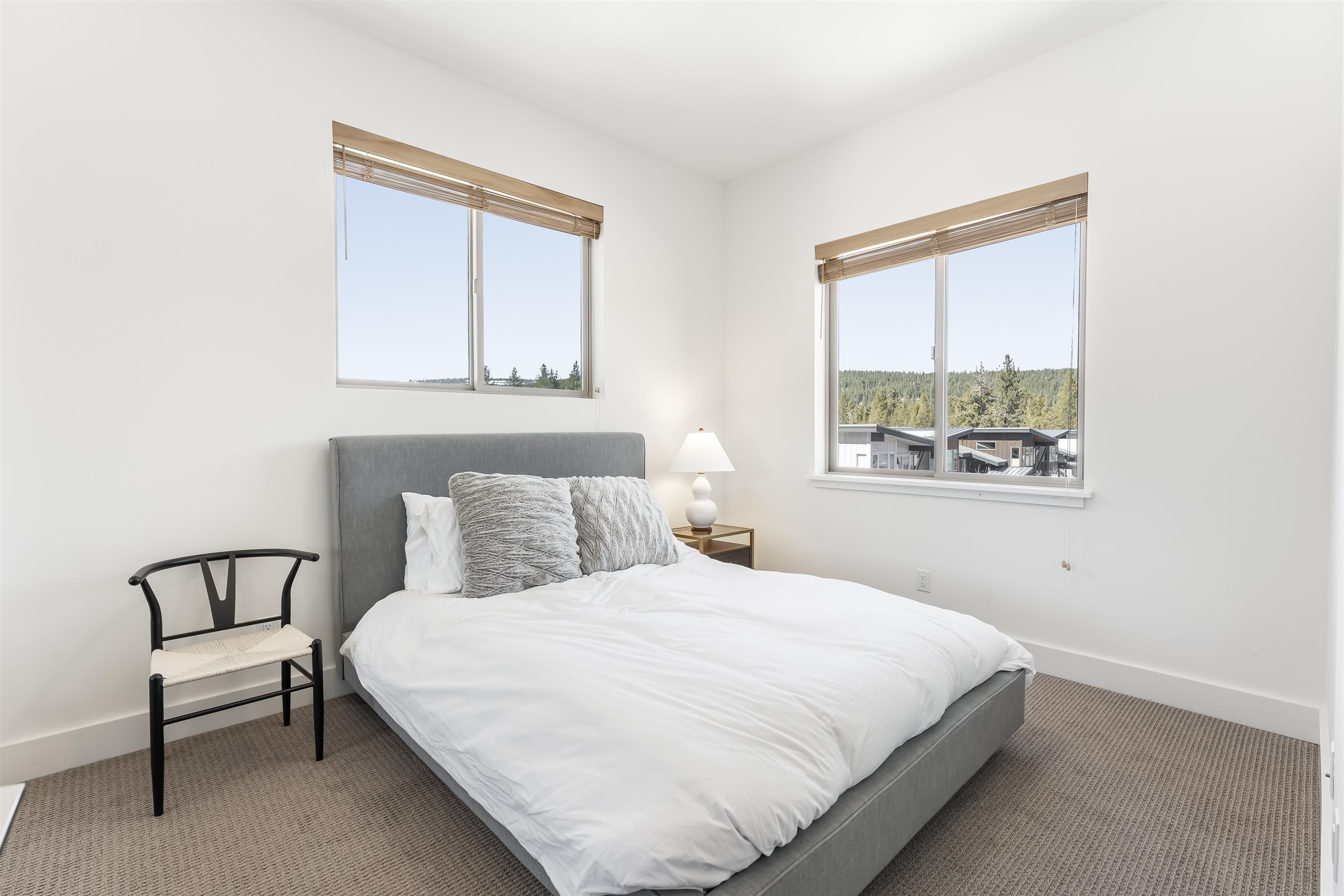11643 McClintock Loop, Unit 4 Truckee, CA 96161 - Photo 4 of 8 a bedroom with a bed and a window