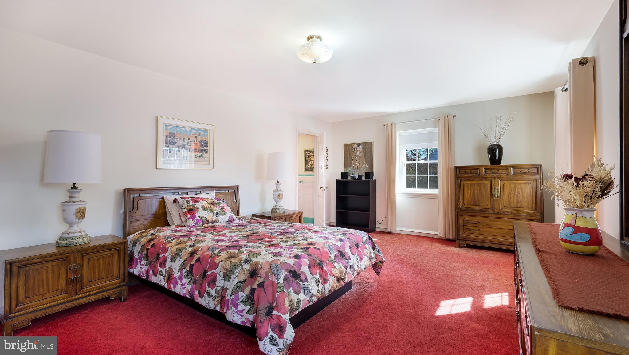 792 Dale Road Jenkintown, PA 19006 - Photo 14 of 27 a bedroom with a bed and wooden floor