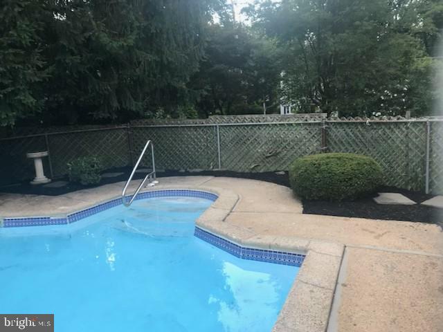 792 Dale Road Jenkintown, PA 19006 - Photo 26 of 27 a view of a lake with a bench in the background