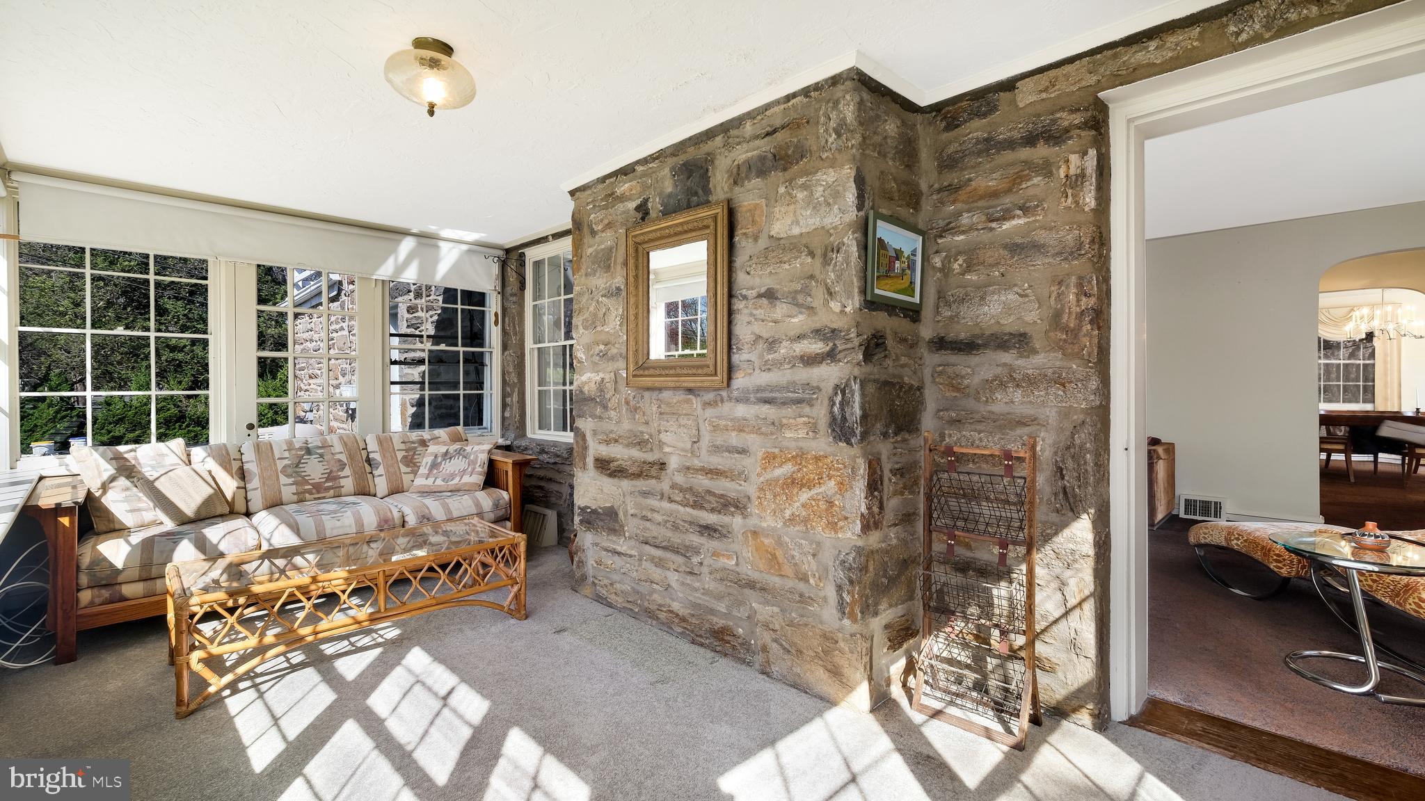 792 Dale Road Jenkintown, PA 19006 - Photo 7 of 27 a living room with furniture and a floor to ceiling window