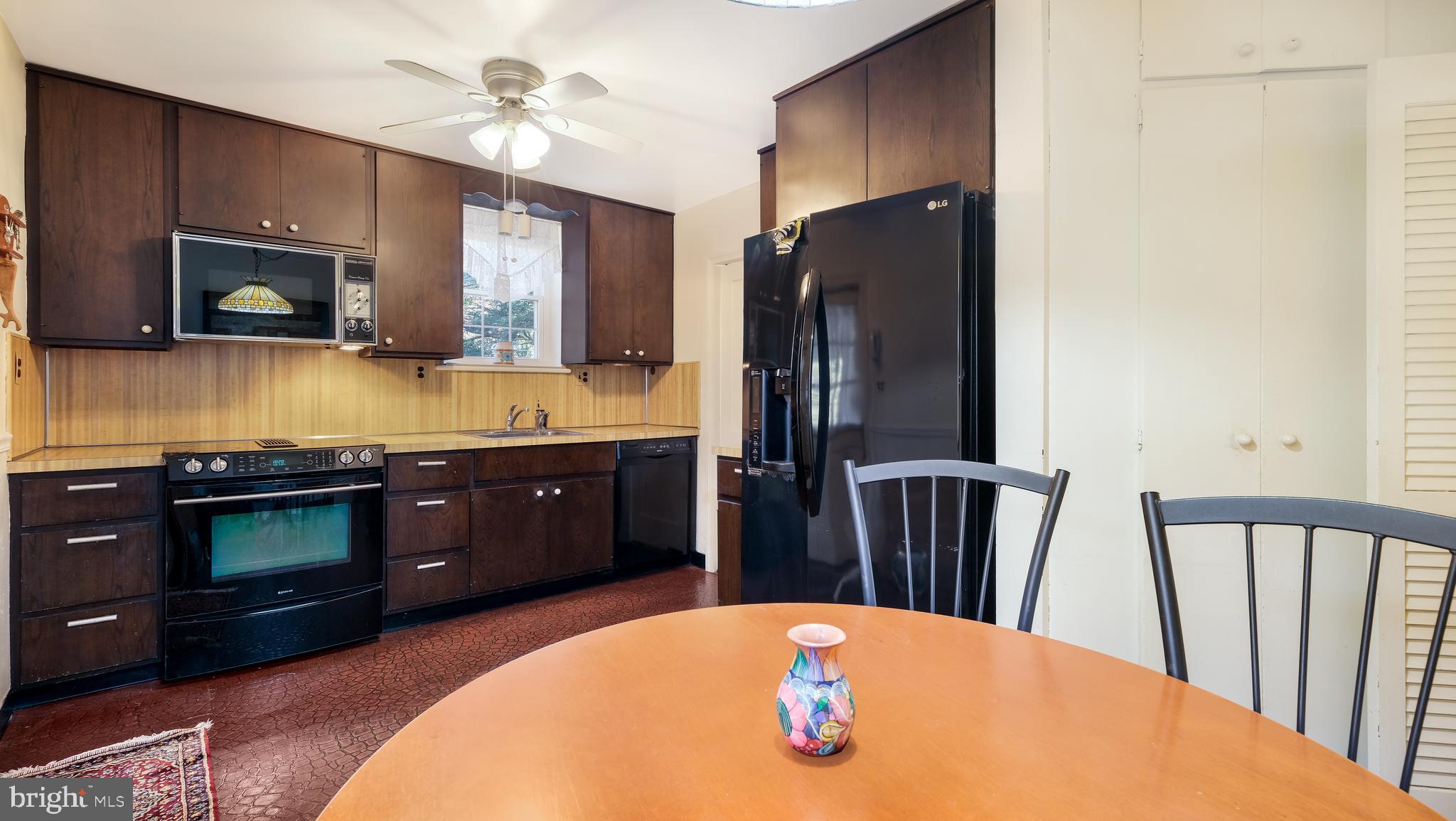 792 Dale Road Jenkintown, PA 19006 - Photo 9 of 27 a kitchen with stainless steel appliances granite countertop a refrigerator a stove top oven a sink and dishwasher