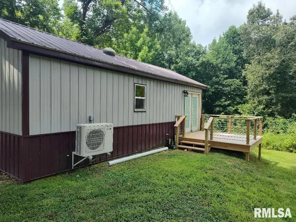 a view of a backyard with a tub