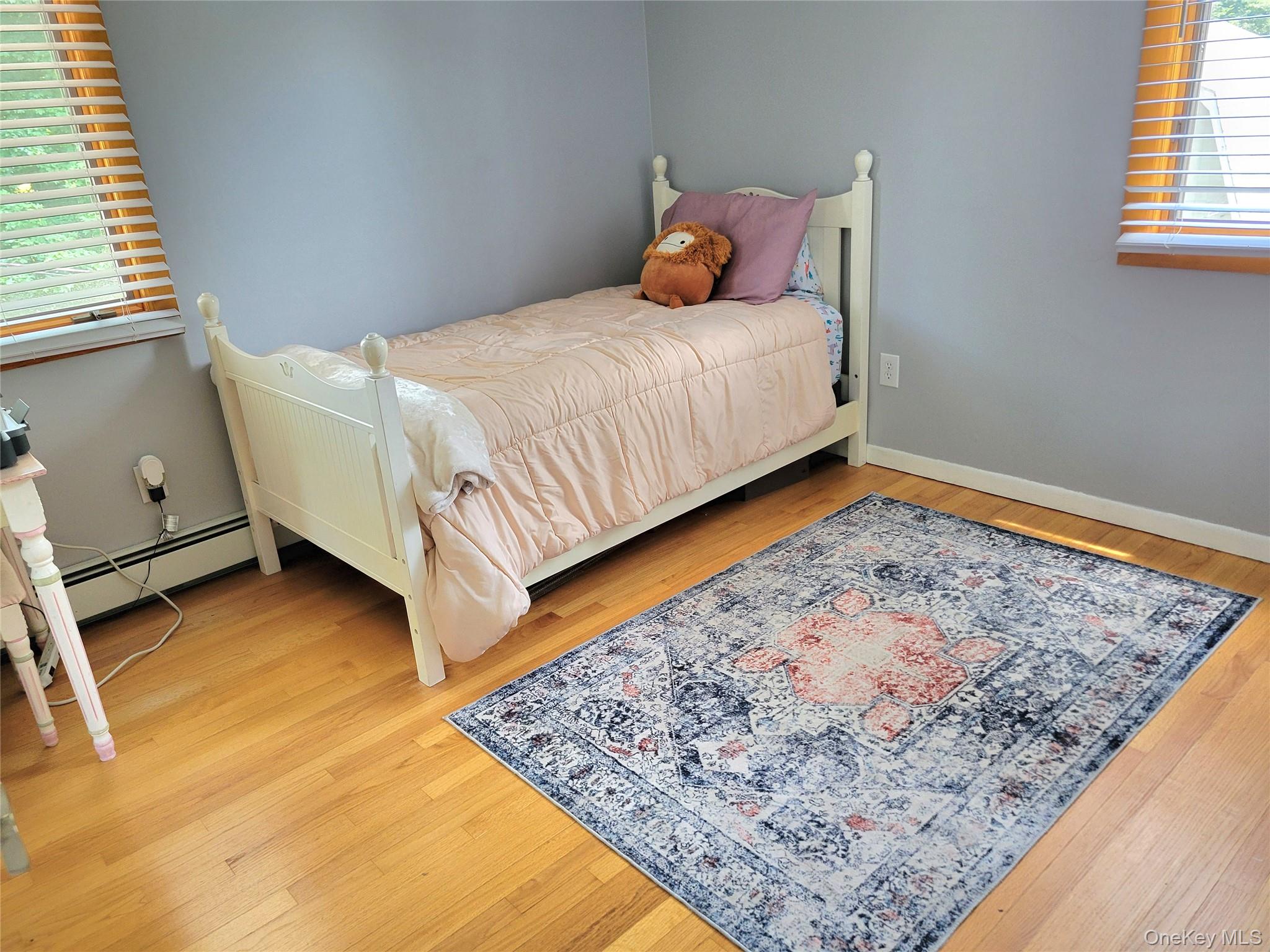 46 Cortlandt Road Mahopac, NY 10541 - Photo 22 of 36 Hardwood flooring complements light gray walls,