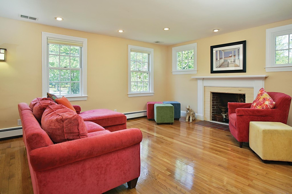 70 Longfellow Road Newton, MA 02462 - Photo 2 of 7 a living room with furniture fireplace and window
