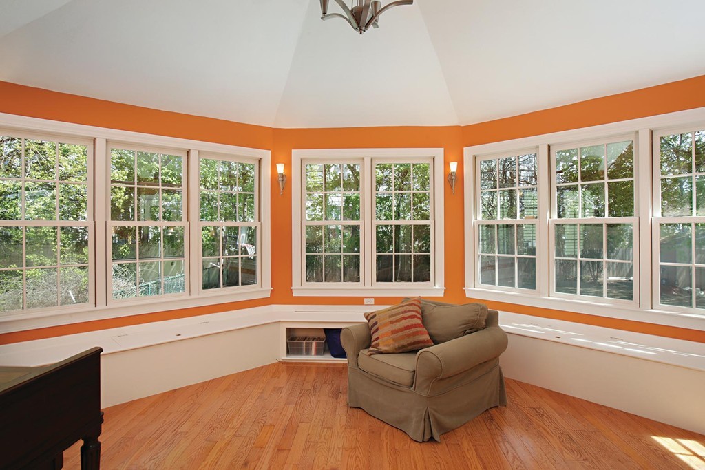 70 Longfellow Road Newton, MA 02462 - Photo 5 of 7 a living room with furniture and a large window