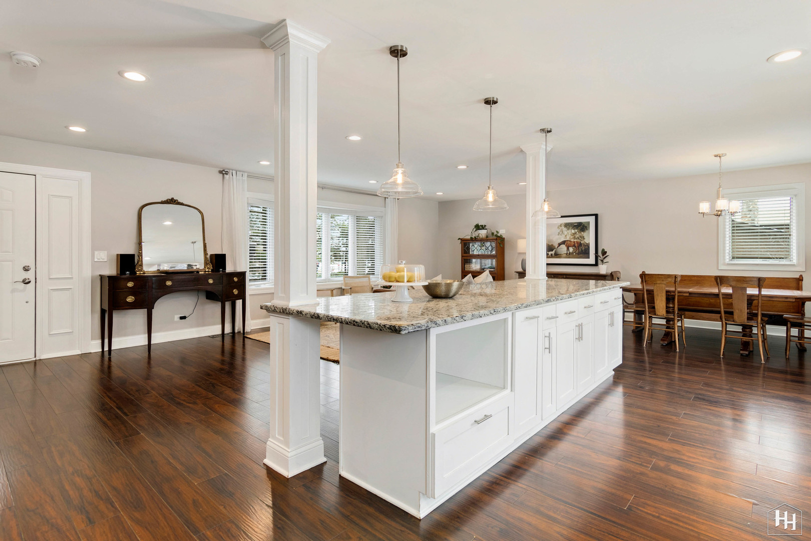 7N298 Longridge Road St. Charles, IL 60175 - Photo 12 of 38 a open kitchen with stainless steel appliances granite countertop a stove top oven a sink a dining table and chairs with wooden floor