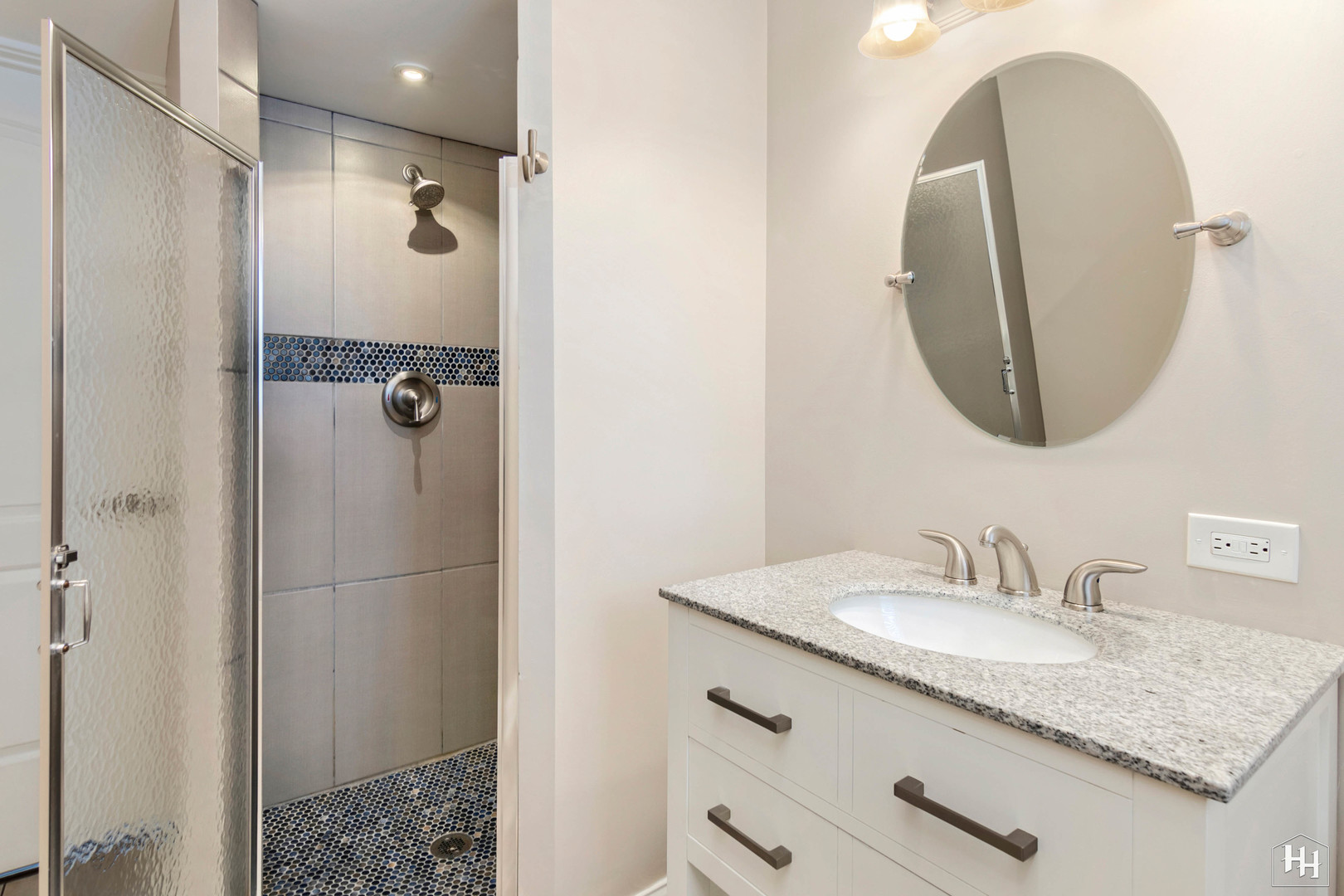 7N298 Longridge Road St. Charles, IL 60175 - Photo 15 of 38 a bathroom with a granite countertop shower a sink and mirror