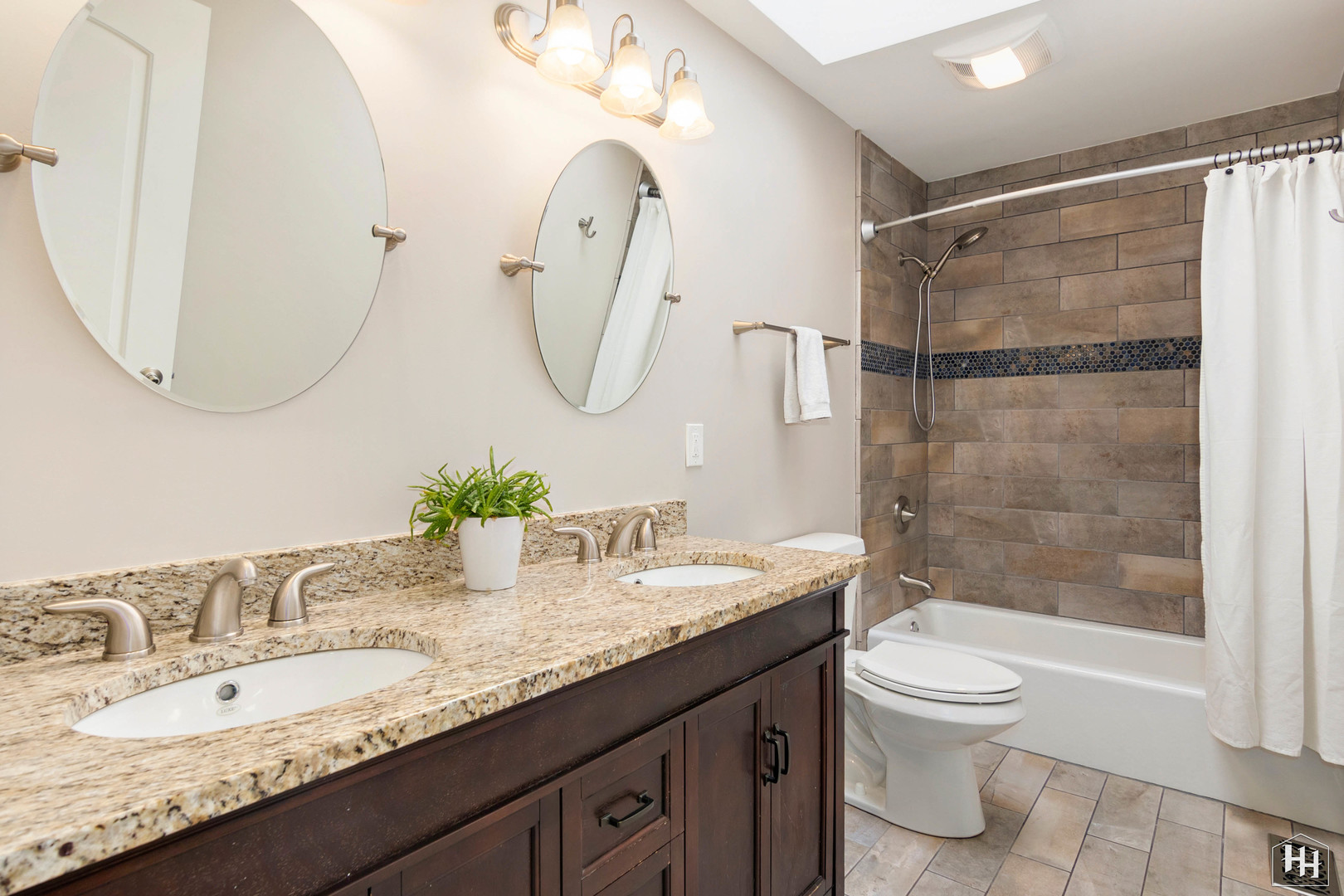 7N298 Longridge Road St. Charles, IL 60175 - Photo 24 of 38 a bathroom with a granite countertop sink a toilet and a mirror