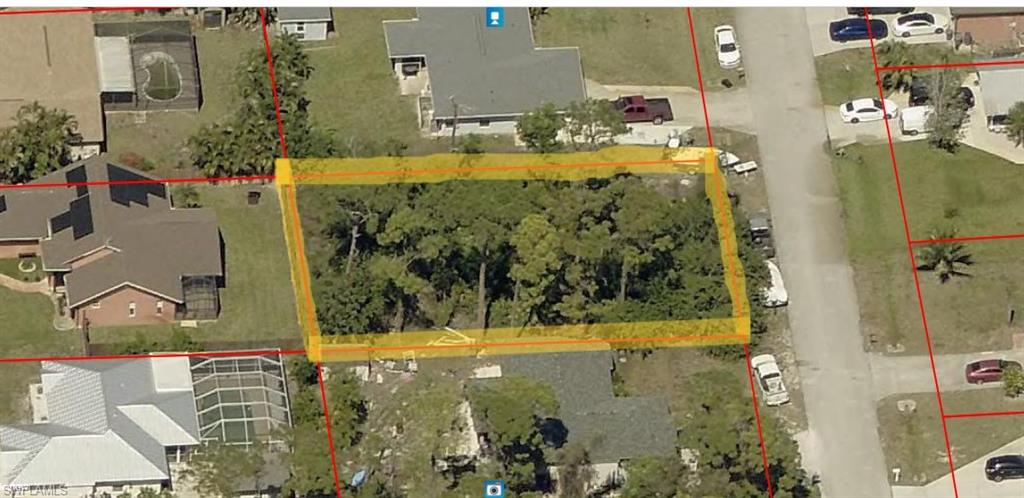 18274 Fuchsia Road Fort Myers, FL 33967 - Photo 4 of 7 Aerial overview of property's location featuring property parcel outlined