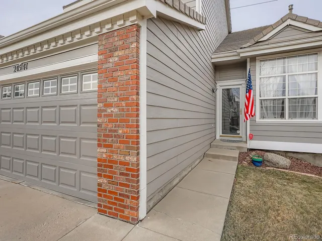 a view of a house with entrance and door