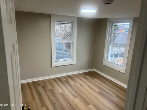 an empty room with windows