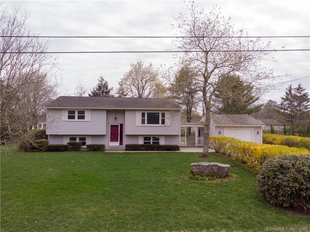 15 Beatrice Avenue Killingly, CT 06239 - Photo 1 of 1 a view of a house with a backyard